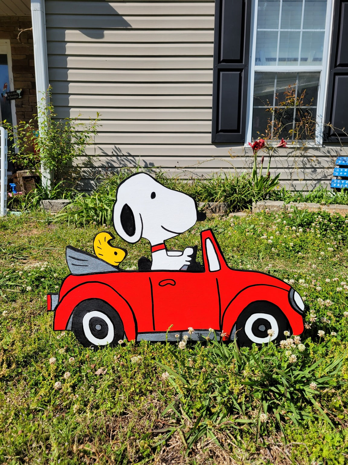 Snoopy driving VW bug