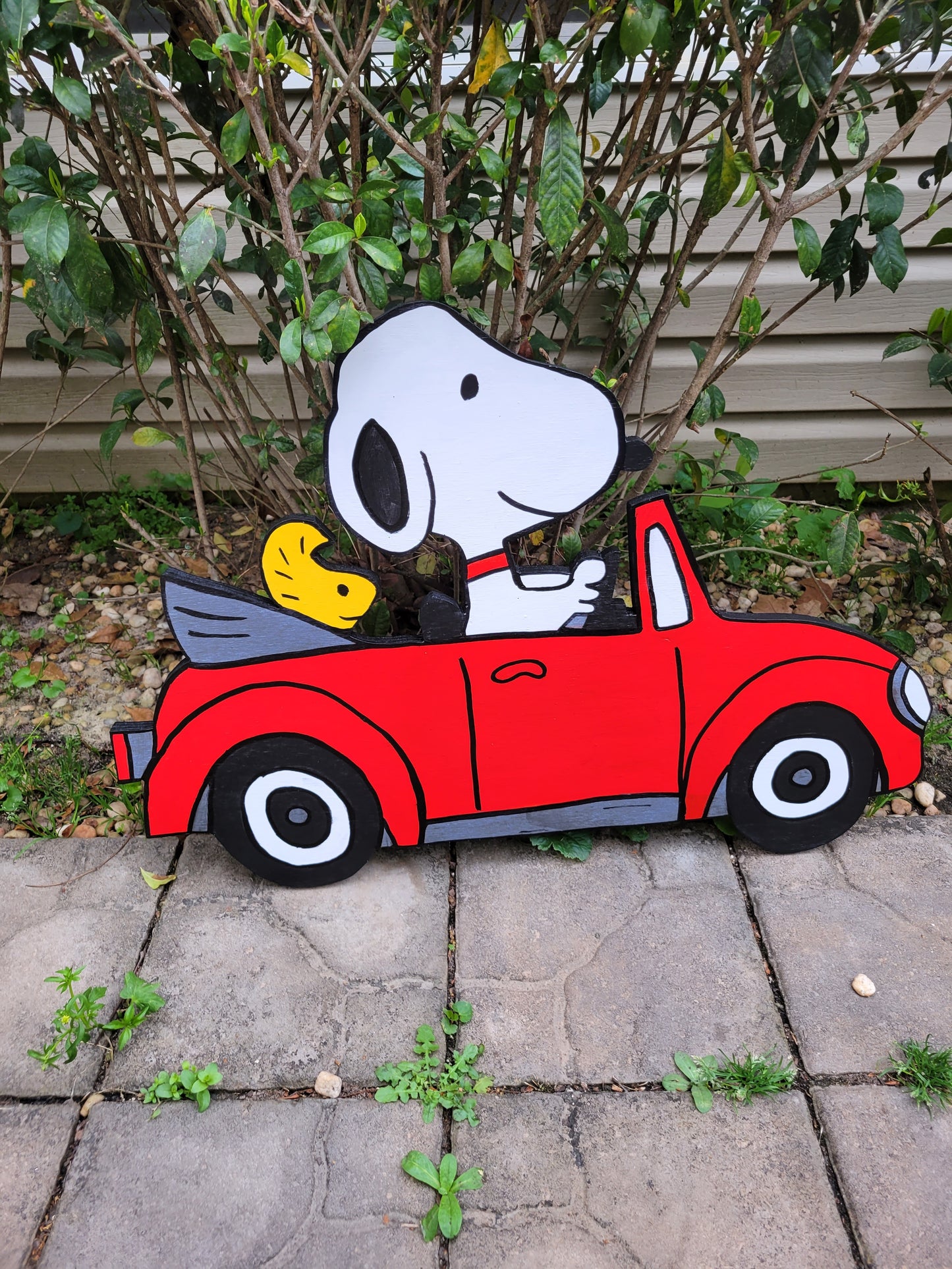 Snoopy driving VW bug