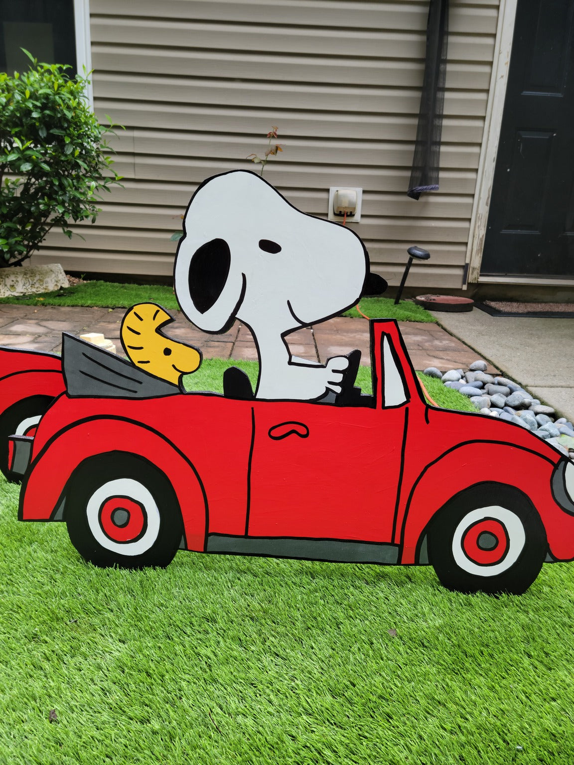 Snoopy driving VW bug
