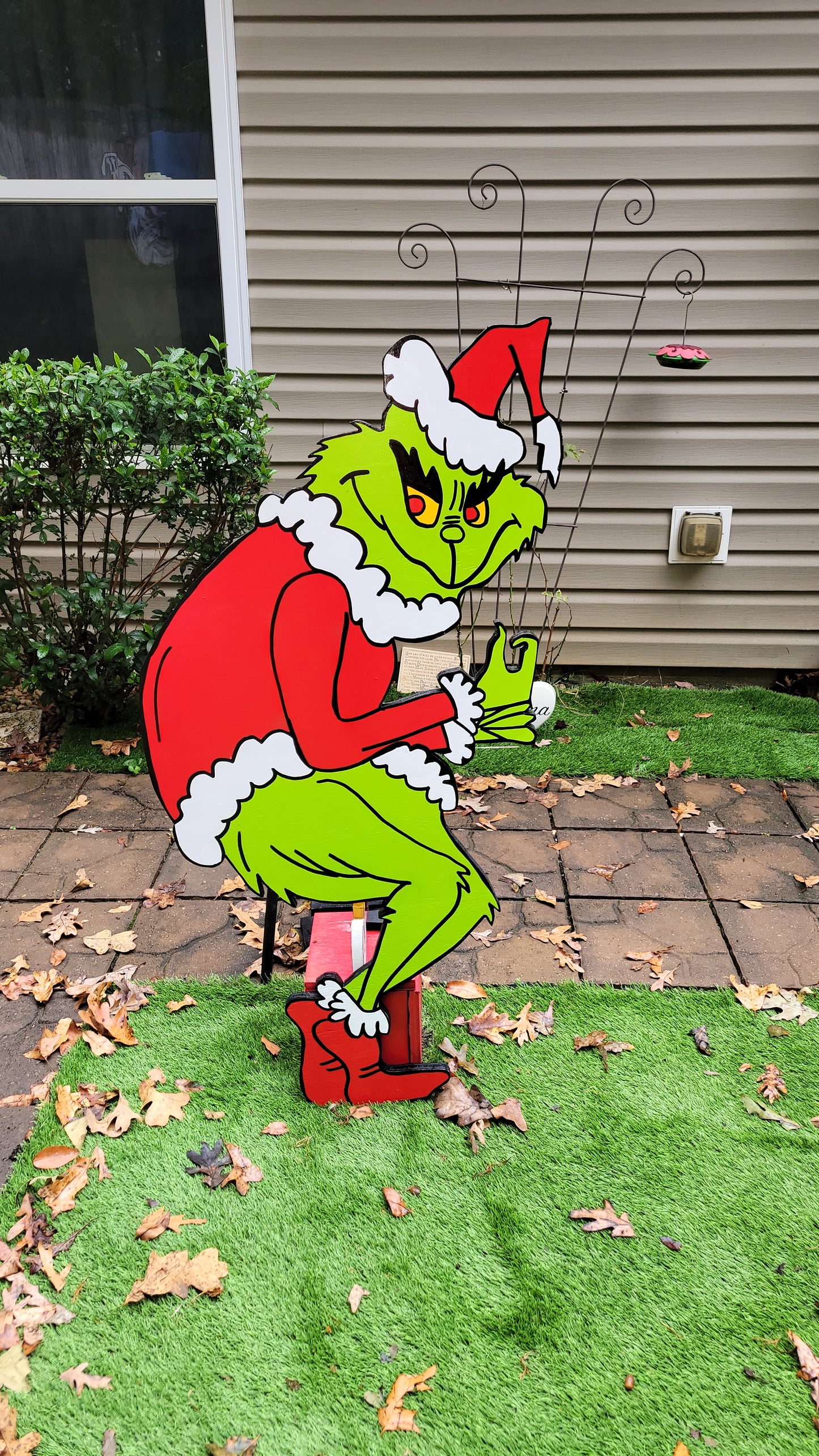Grinch steeling Christmas lights. Lifesize yard art