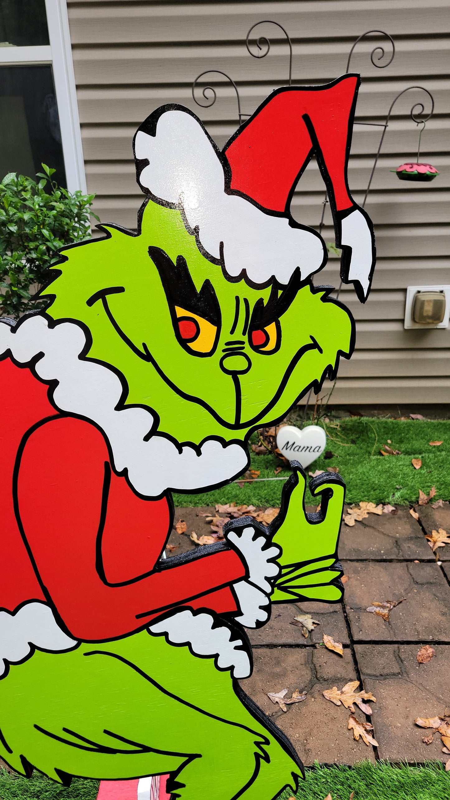 Grinch steeling Christmas lights. Lifesize yard art
