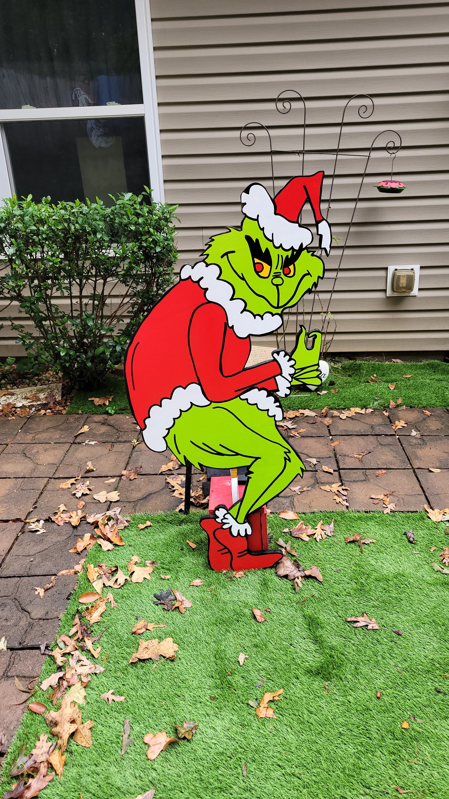 Grinch steeling Christmas lights. Lifesize yard art
