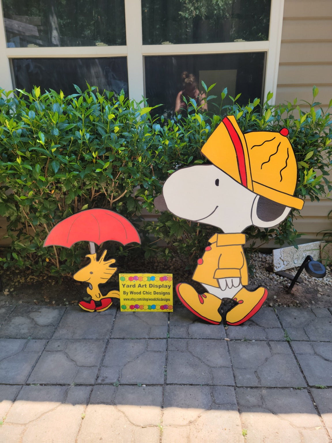 Snoopy wearing raincoat, lifesize