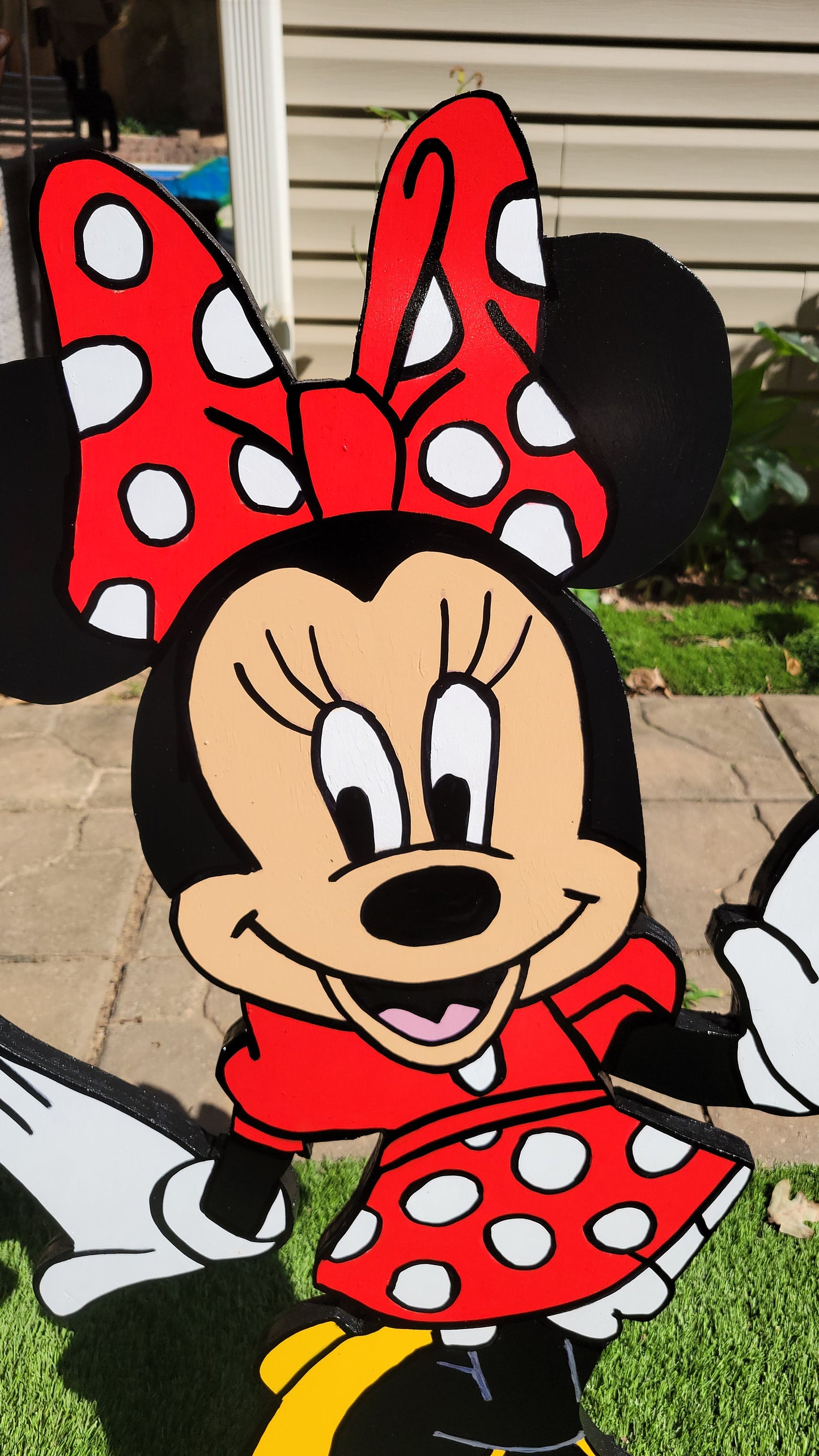 Mickey and Minnie Mouse yard art