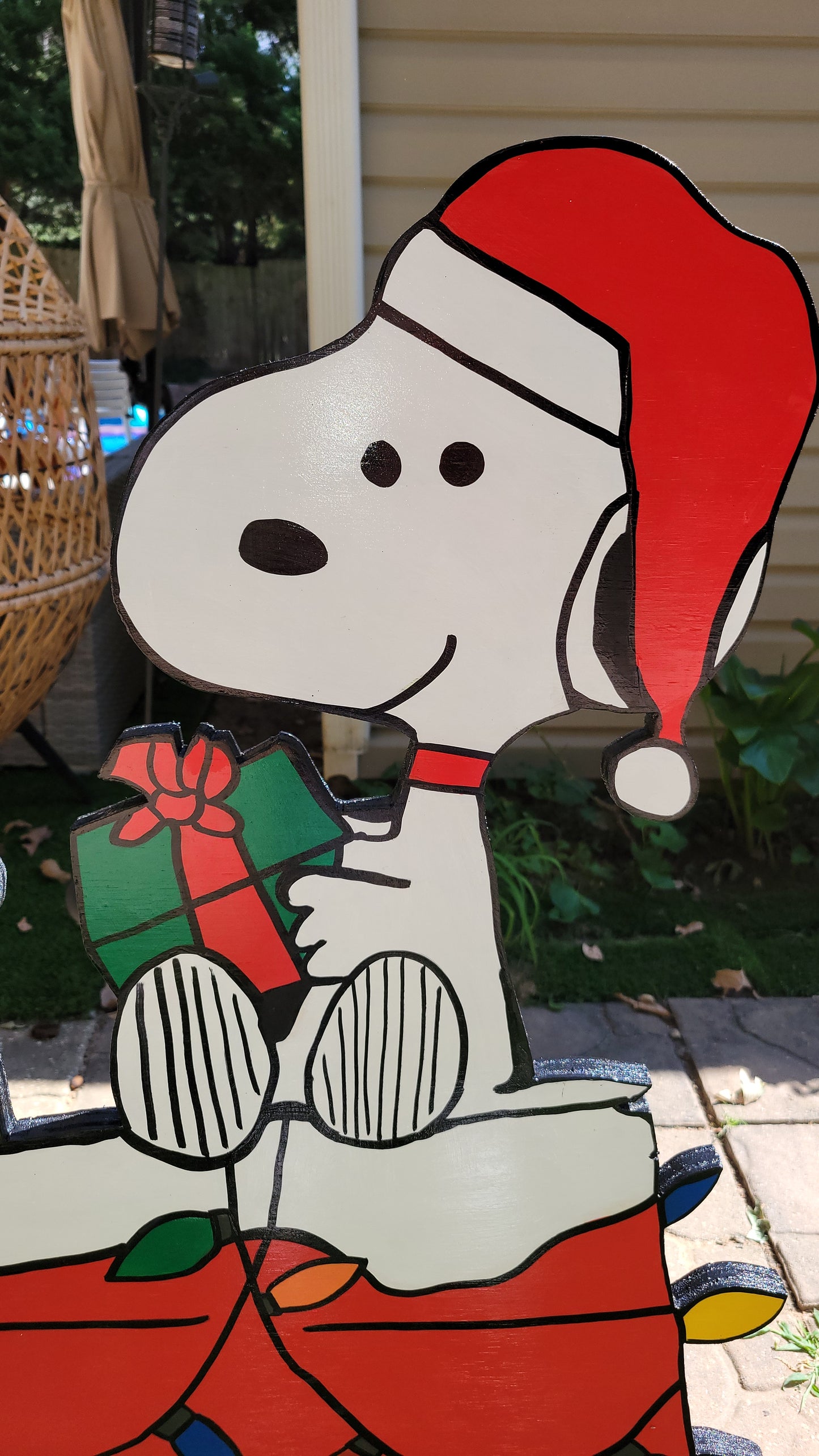 Christmas Snoopy doghouse yard art display