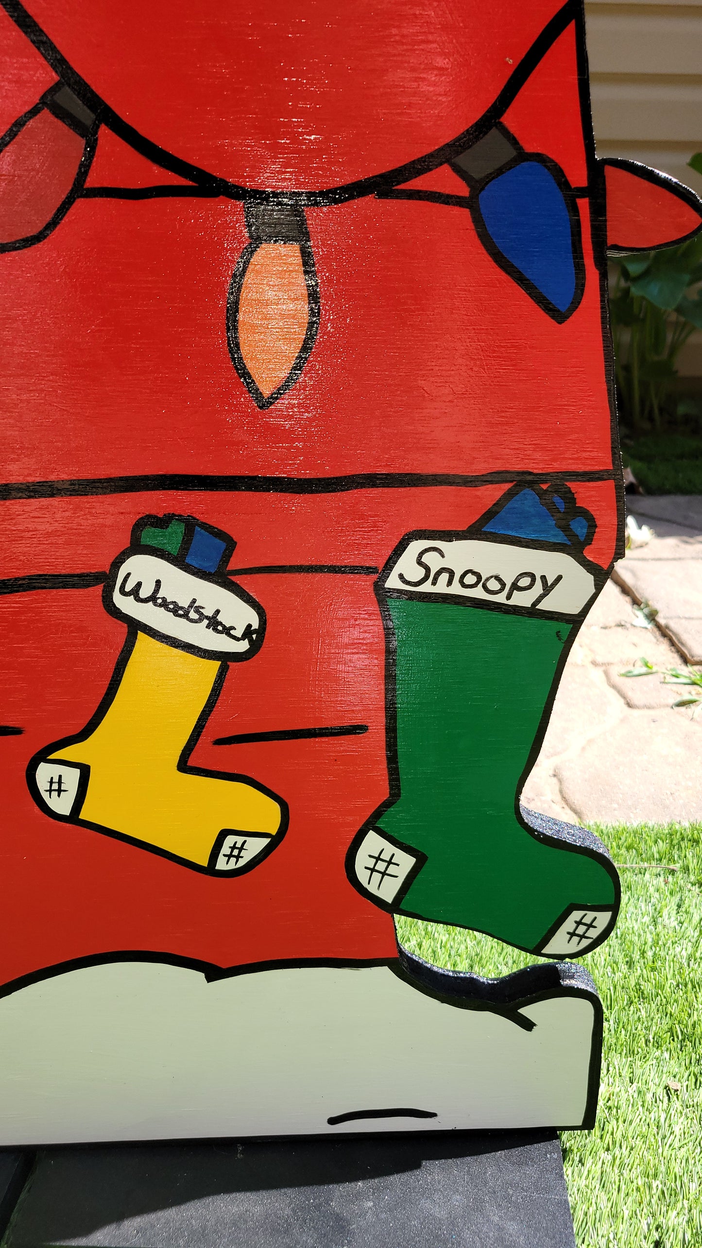 Christmas Snoopy doghouse yard art display