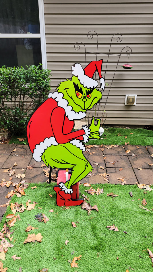 Grinch steeling Christmas lights. Lifesize yard art