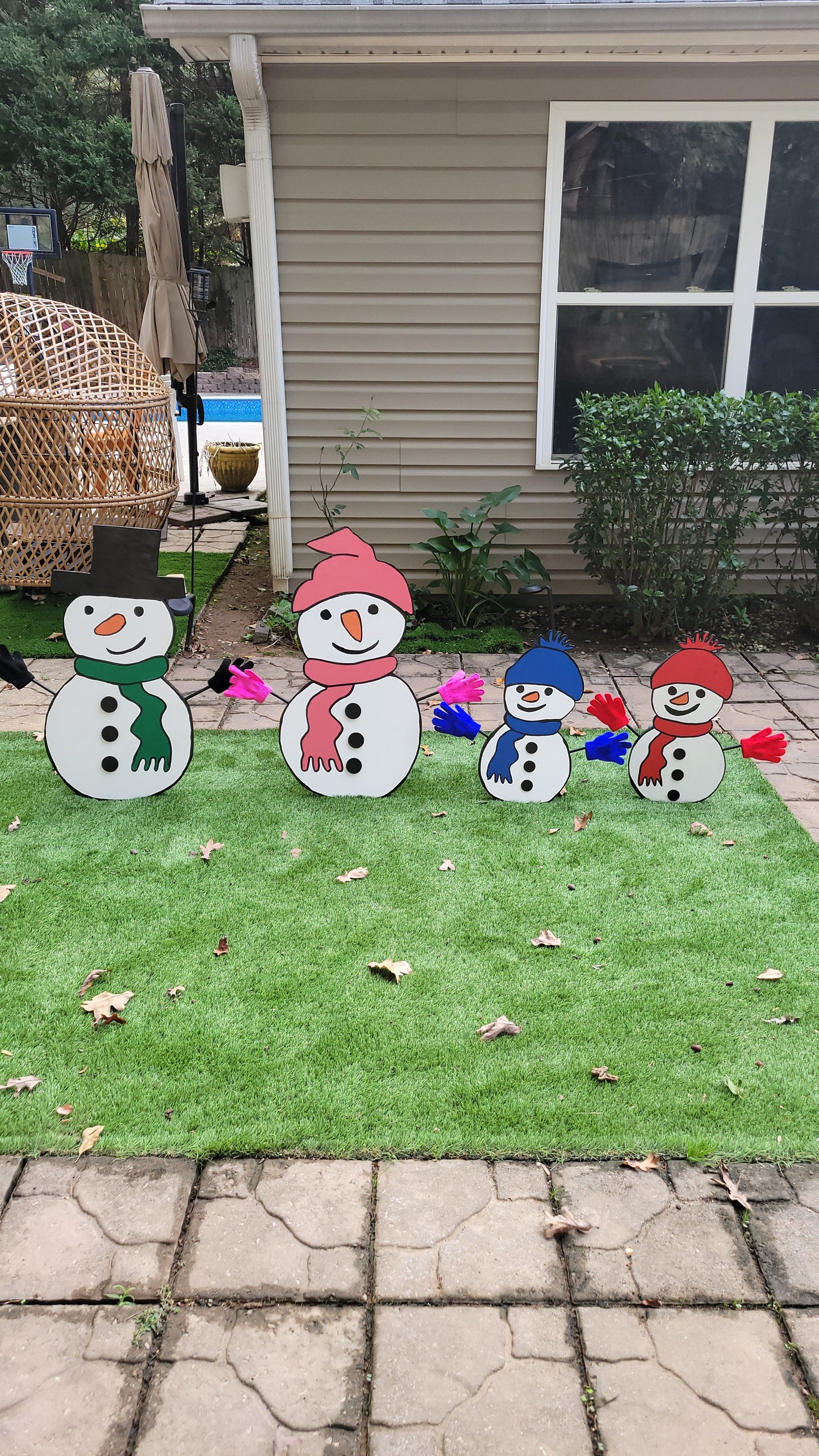 Snowman family Christmas yard art display