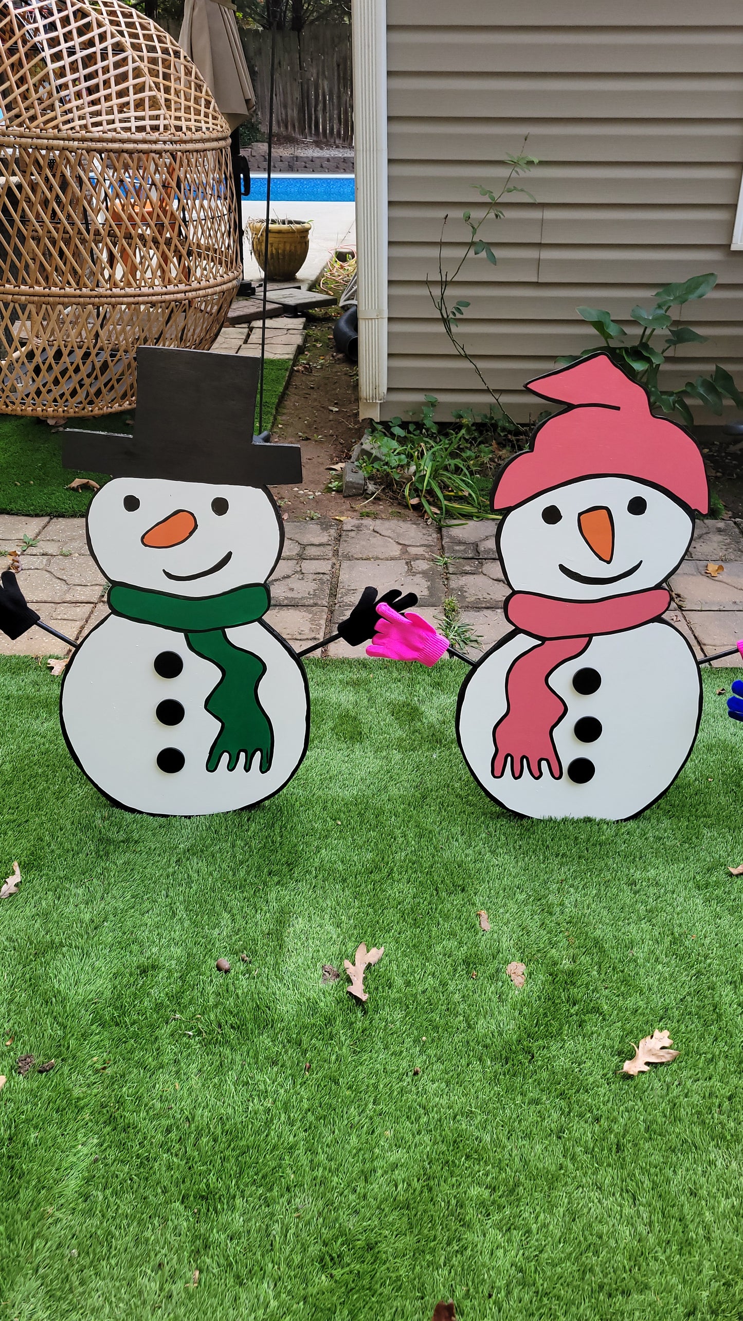 Snowman family Christmas yard art display