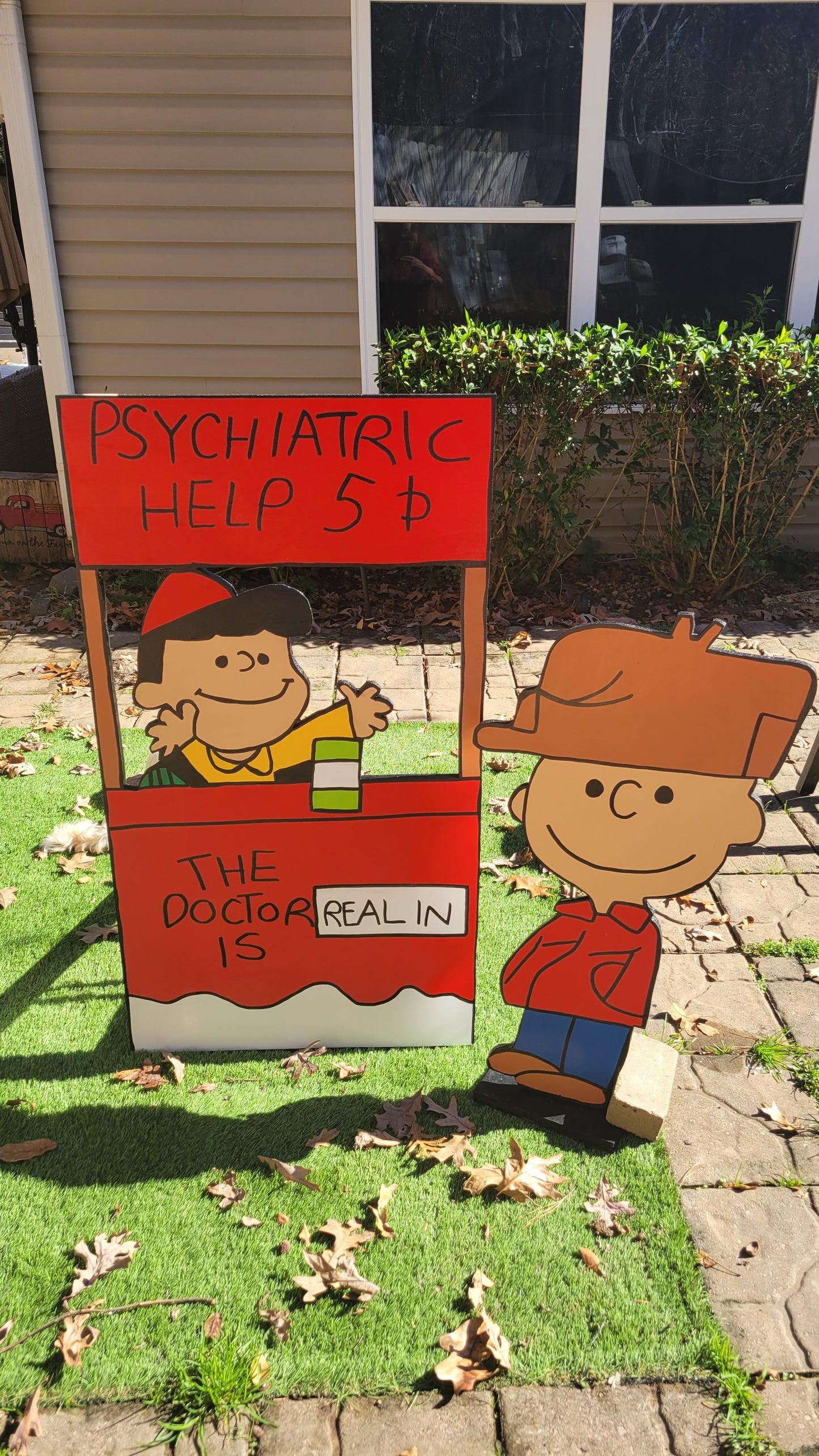 Lucy, the real doctor, is in with Charlie Brown