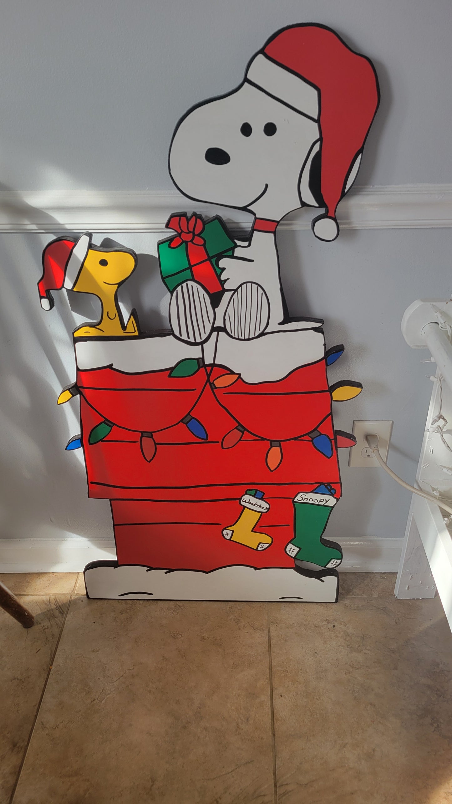 Christmas Snoopy doghouse yard art display