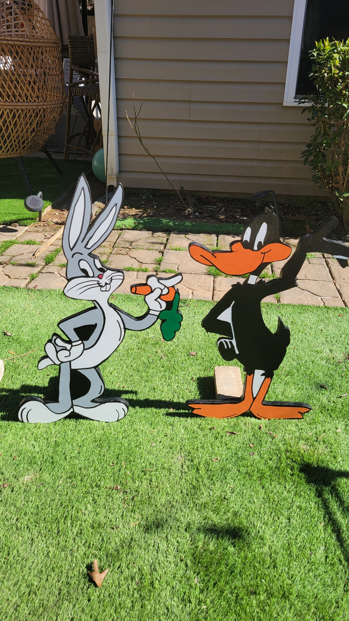 Bugs bunny and Daff Duck yard art