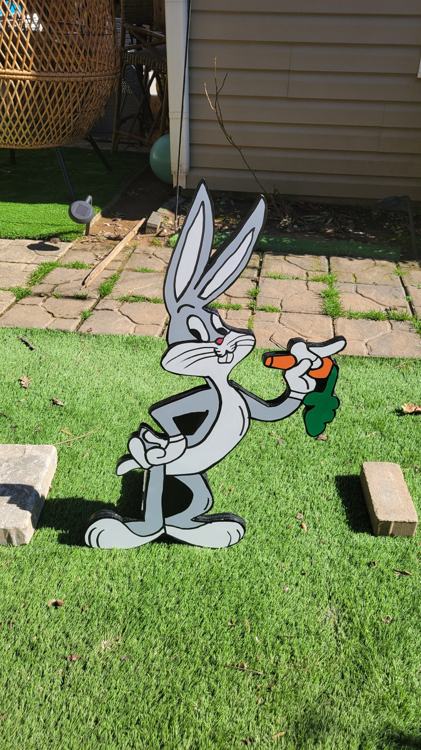 Bugs bunny and Daff Duck yard art