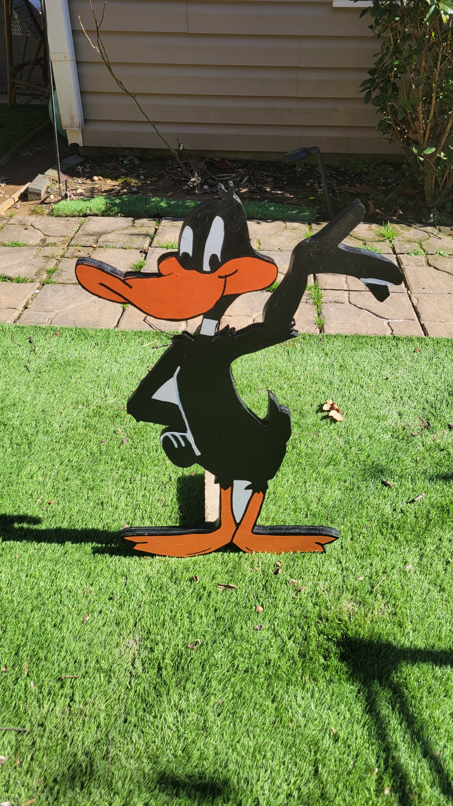 Bugs bunny and Daff Duck yard art