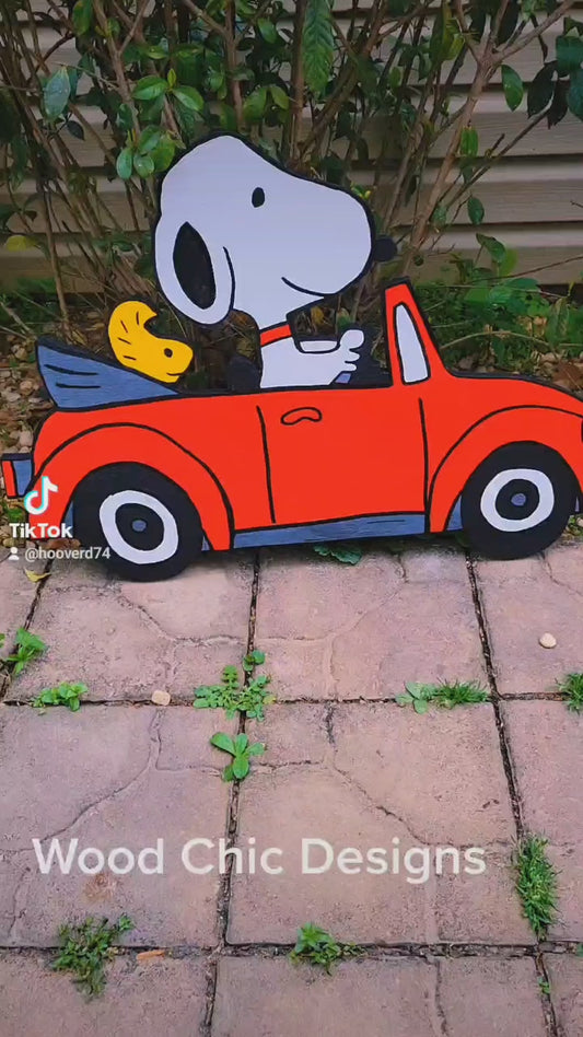 Snoopy driving VW bug